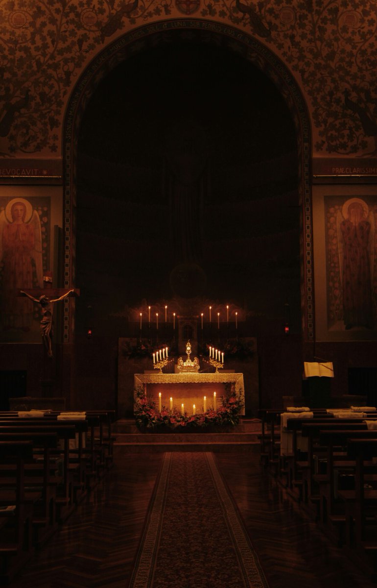 Praying in a darkened quiet church is one of the most peaceful moments in life