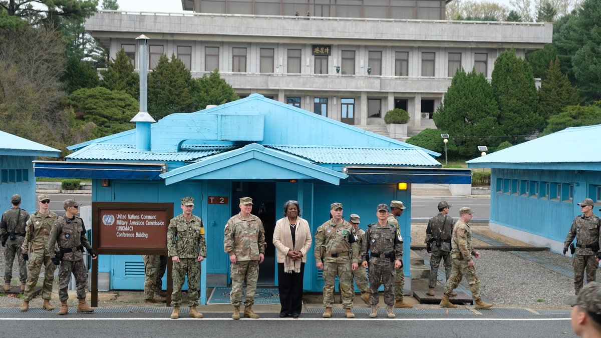US Ambassador to UN Linda Thomas-Greenfield (center, right) visits the joint security area at the DMZ between the two Koreas, with US Forces Korea Commander Gen. Paul LaCamera (center, left). N. Korean soldiers can be seen watching from the Panmun Pavilion behind them.