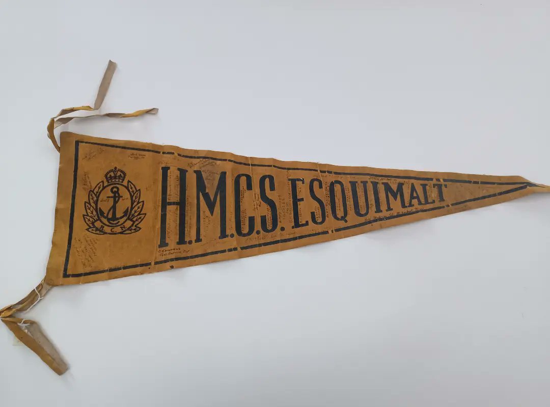 NavalMuseumHFX's tweet photo. #OTD in 1945, HMCS ESQUIMALT was torpedoed and sunk by German sub U-190. Thirty-nine were lost, and the remaining survivors were picked up by HMCS SARNIA. This pennant was signed by all the crew members only nine months before the ship was lost. (photo: ship company , March 1945) https://t.co/z11XY3F51G