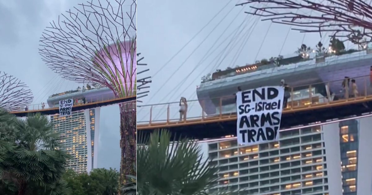 3 people unfurl 'End SG-Israel Arms Trade' banner at Gardens By The Bay, police investigations ongoing bit.ly/3UjIKZ6