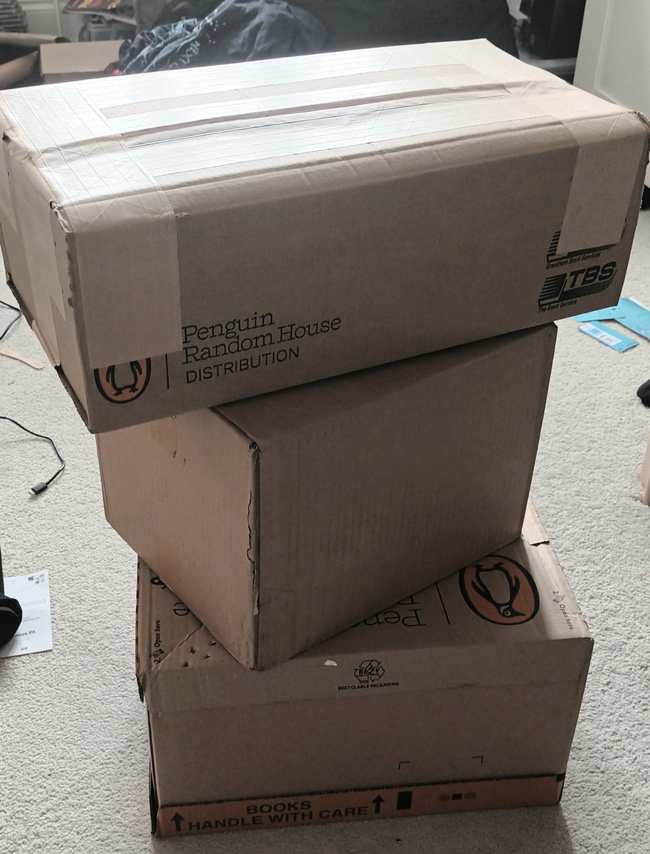 3 (three) boxes have just arrived. My guess is that inside there are books. Shall we find out? (this is Ollie's bedroom btw as I have no room for boxes in my office)