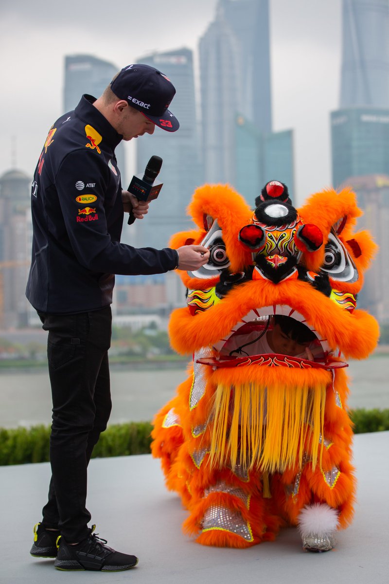 redbullracing's tweet photo. What do you think Max said to the dragon? 😅😝 

#ChineseGP #TB https://t.co/dh63SD9I2Y
