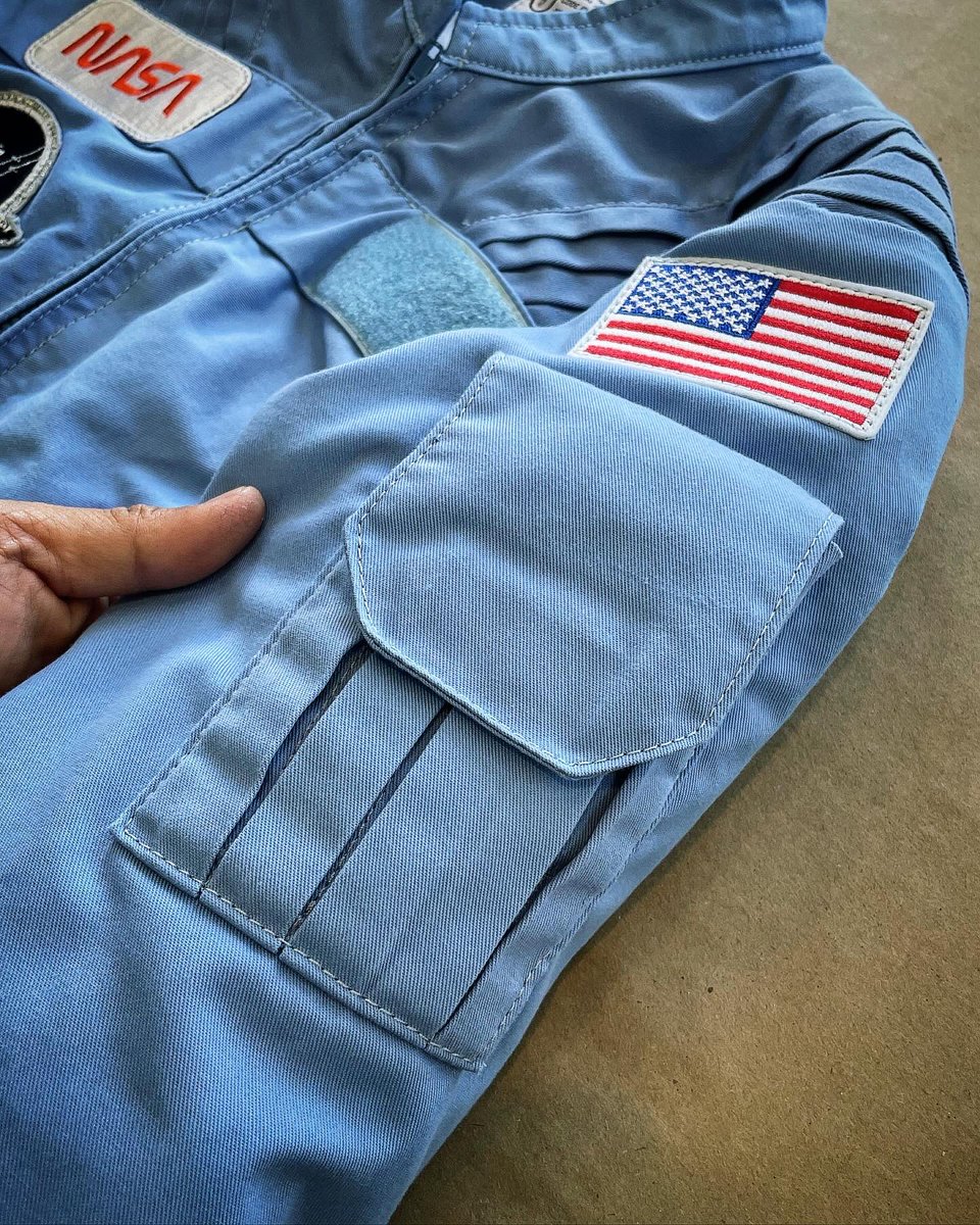 ryannagata's tweet photo. I made a replica of an early Space Shuttle coverall jacket. Started out as one of those space camp souvenir jackets, but I ended up replacing 70% of it. It wasn’t as accurate as I initially thought. Now it’s pretty spot on. https://t.co/SgzGqDmcqx