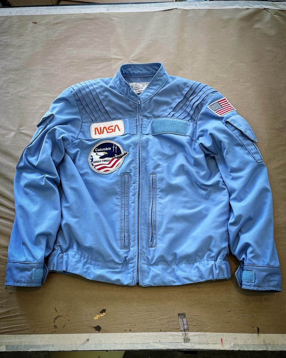 ryannagata's tweet photo. I made a replica of an early Space Shuttle coverall jacket. Started out as one of those space camp souvenir jackets, but I ended up replacing 70% of it. It wasn’t as accurate as I initially thought. Now it’s pretty spot on. https://t.co/SgzGqDmcqx
