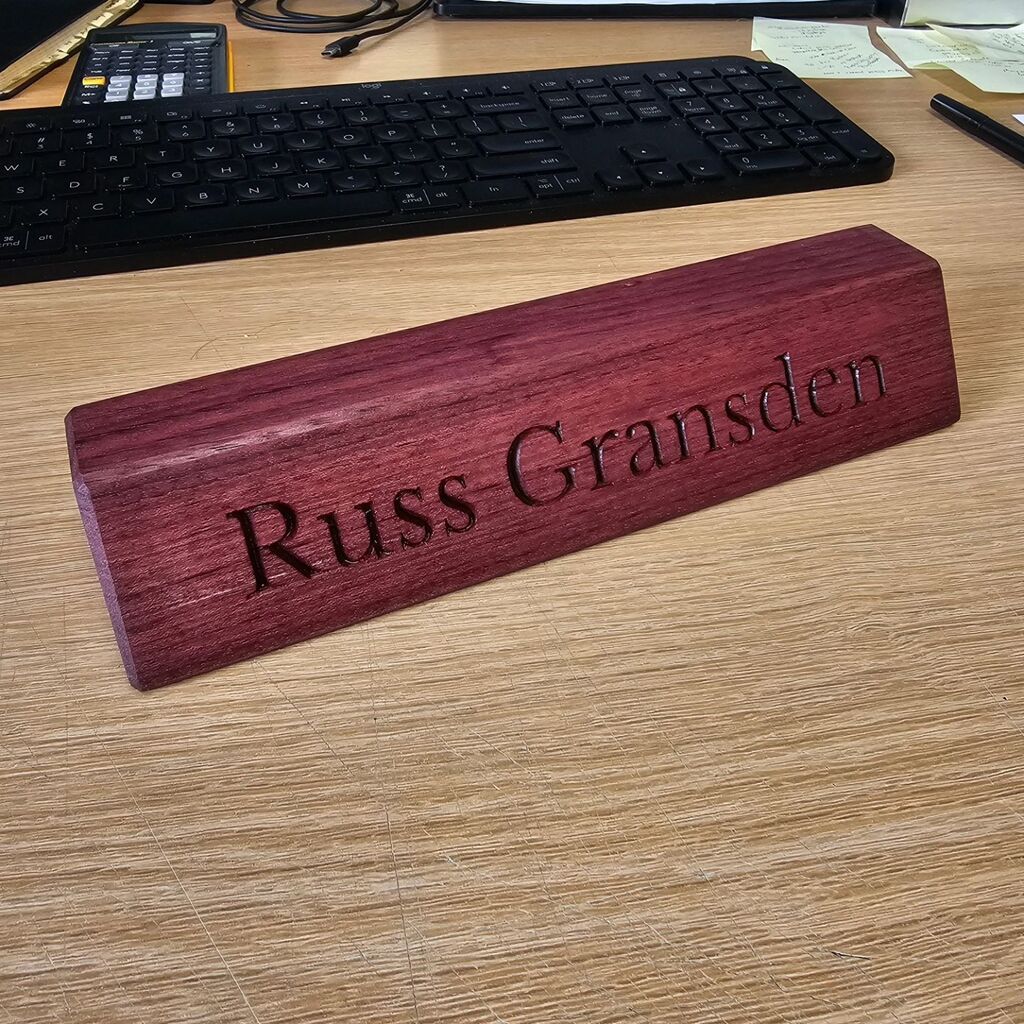 Balegedoo's tweet photo. For the last year or two, I've been making walnut nameplates for all our new hires at work. I finally decided to make myself one, but of course, mine needed to be purpleheart. #woodworking https://t.co/7vfl9SjYn7 https://t.co/BlrFs46Re5