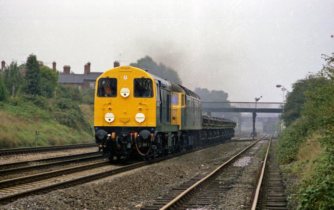 Recently repainted and overhauled 20054 heads a (failed?) class 47 and a rake of Mermaid type ballast wagons near Shrewsbury 14th June 1982 #TwentiesOnTuesday 📸 Ian Cuthbertson