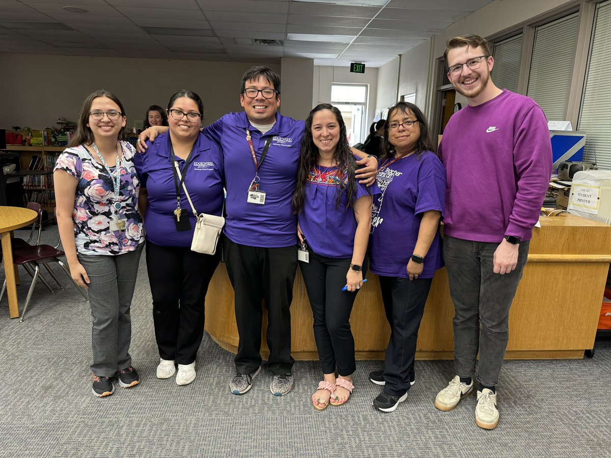 A few of our staff members wearing purple to support military children 💜