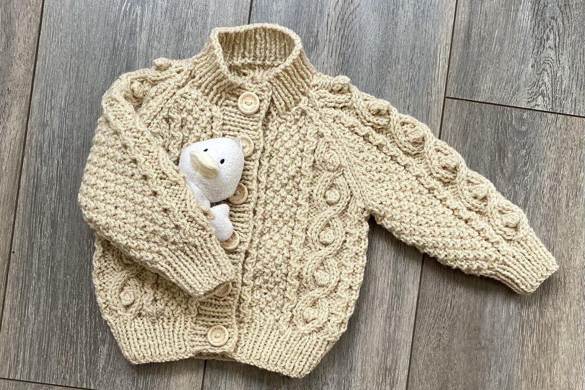 etsy.com/uk/listing/171… 
Listed on Etsy today - baby girl hand knitted cardigan in a neutral beige- wool blend yarn - cable pattern and fastens with 6 wooden buttons - classic style 
#MHHSBD #atsocialmedia #britishcraft #firsttmaster #CraftBizParty