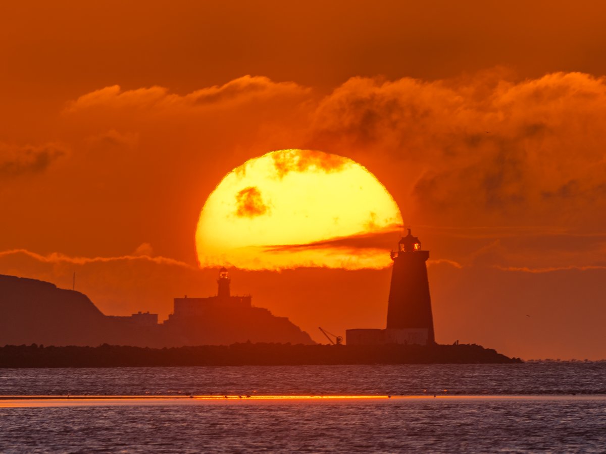 In February I got the full moonrise between Poolbeg and Baily Lighthouses from Sandymount Strand. This became my most popular image of all-time. I made it my goal to also get the sunrise when the time would come, this morning was that. It's not perfect though.