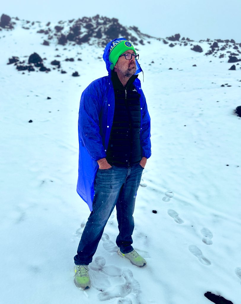 DOB01's tweet photo. I'm away for this week's game in Brisbane. But got to break out the @blakeandthepork beanie on summit of Mt Etna. No eruptions today but hopefully a massive green explosion back in Brissie this weekend. #GoGreenMachine https://t.co/tvnKj570RW