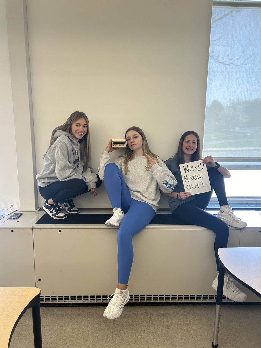 Students in Mr. Davis's math classes build bridges out of hot glue and popsicle sticks.  Incredibly, these two groups designs were able to hold over 800 pounds!  Great work!  #WeAreCC