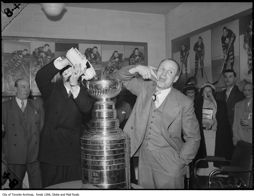 #OnThisDay 75 years ago, Toronto Maple Leafs coach Hap Day was tasting champagne from the Stanley Cup after his team won the playoffs. Someday, Toronto... ow.ly/EaUk50RbIw5 #OTD #StanleyCup #TOHistory #TorontoArchives