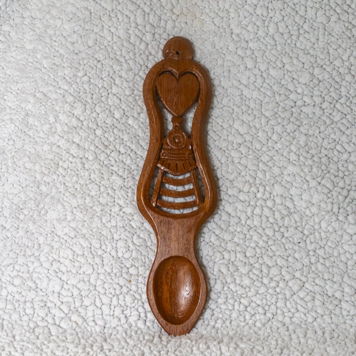Train themed lovespoon, handcarved from an old Jarrah railway sleeper. 

#lovespoon #welshlovespoon #handcarved #madeinwales #madeinpembrokeshire #spooncarving #spoon #trains
