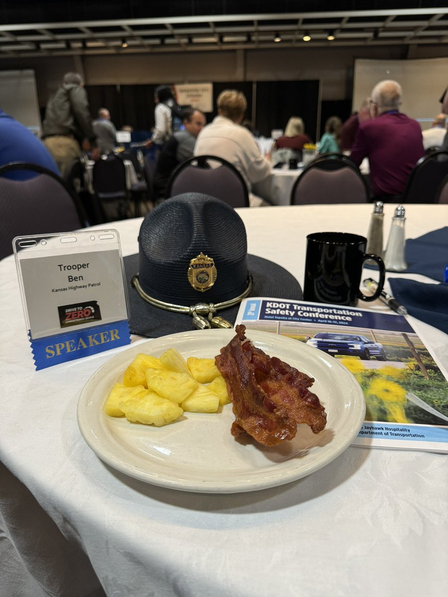 TrooperBenKs's tweet photo. Show me a better way to start a Tuesday, cause YOU CAN’T!  😀

In uniform, attending the 2024 Kdot Transportation Safety Conference in Topeka. 

So good!
Coffee, bacon, pineapple!
Ready to learn! 
#KansasTSC https://t.co/jLfOweXqWw