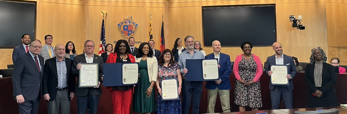 Councilmembers @CM_Sayles and @MC_Council_Katz present a proclamation celebrating the 15th anniversary of the Gaithersburg Book Festival @GburgBookFest