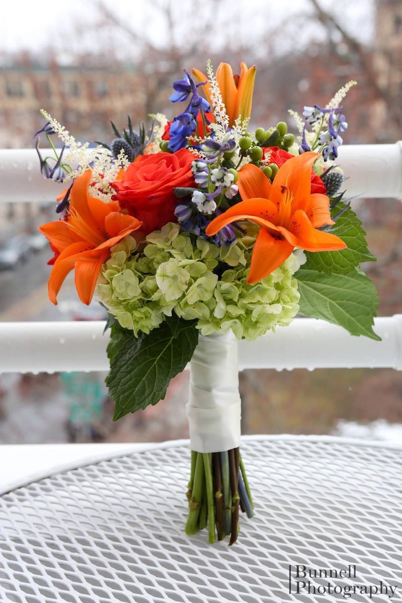 This gorgeous bouquet by Forget Me Not Florist, photographed by Bunnell Photography, popped up in our memories today. Look at those vibrant colors!