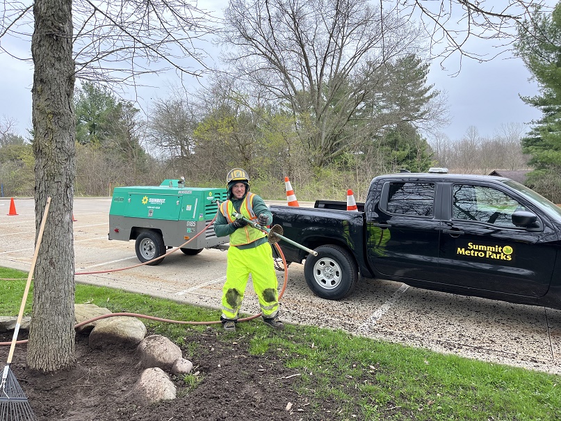 Protecting trees is dirty work, but someone has to do it! Crews at F.A. Seiberling Nature Realm took steps to ensure the health of trees near the parking lot, including removing built up dirt around trunks. Visitors may notice crews performing similar work around the district!