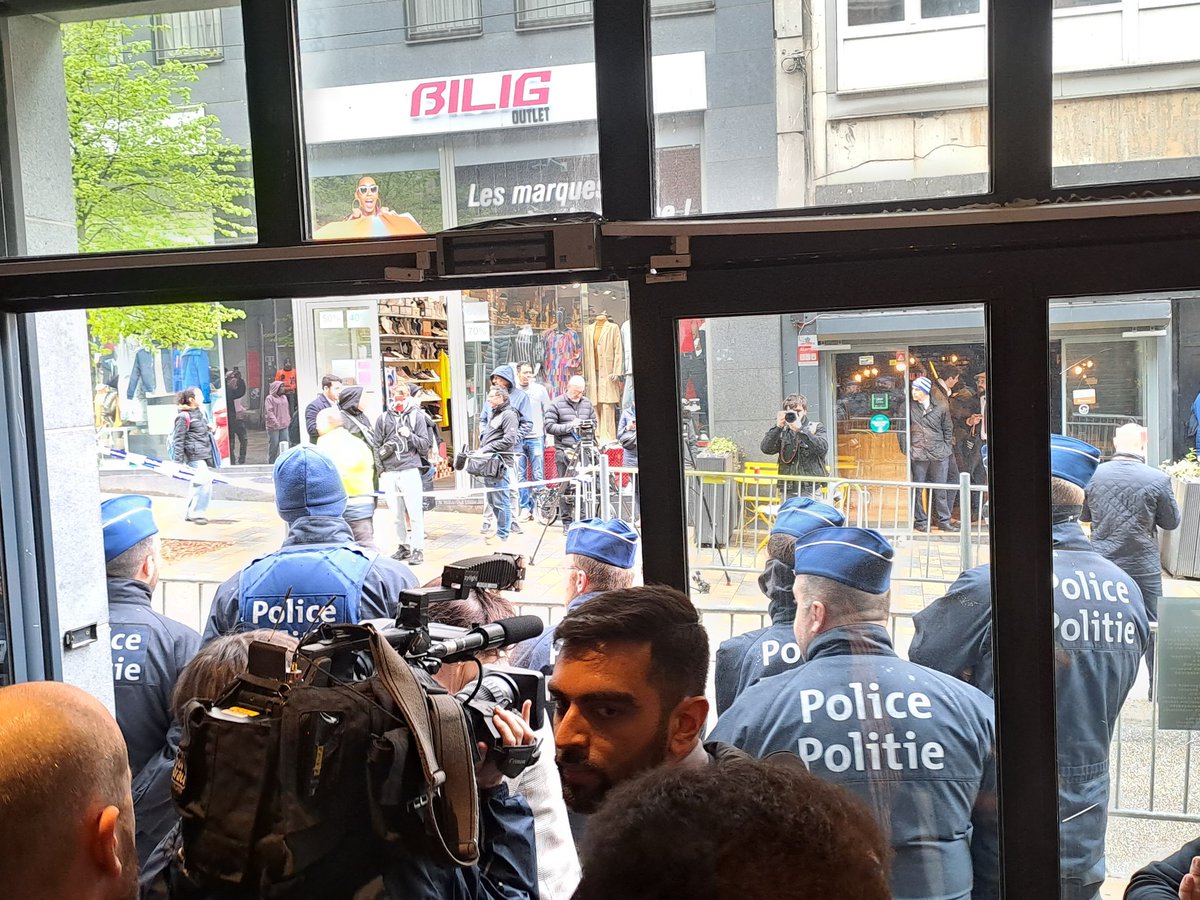 Update: We are still under siege here at @NatConTalk Brussels: Even speakers are refused access to the venue, strictly blocked by the police. Will the electricity be blocked as rumours have? Will we be able to have our dinner delivered? Will we be able to come back tomorrow?