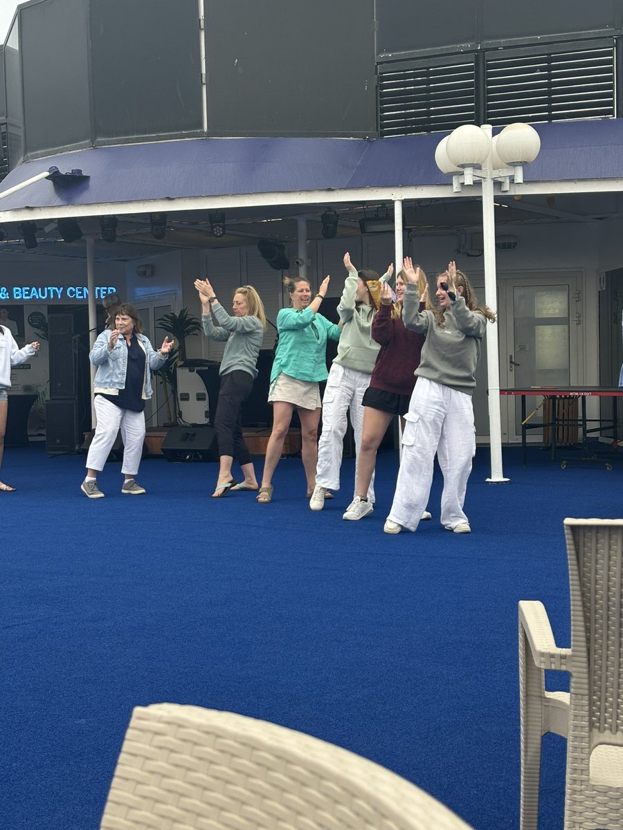 FHS2Greece's tweet photo. The cruise staff is keeping our students busy and entertained! Here are some students and chaperones learning belly dancing 💃🏻 🕺🏻 https://t.co/G84gthKZoV