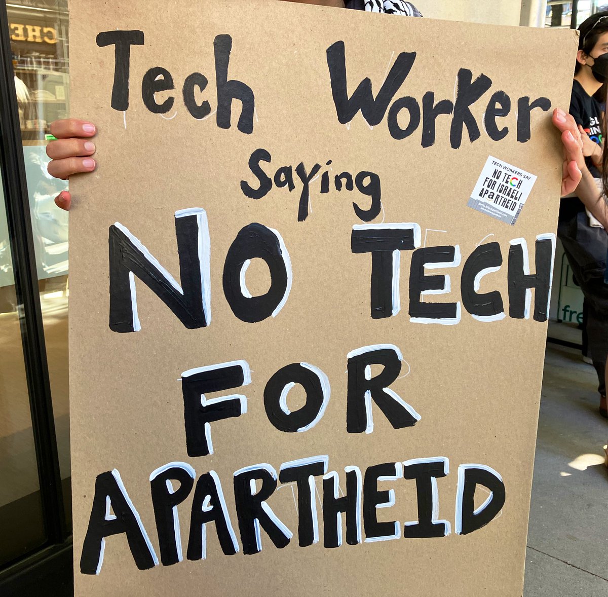 AshAgony's tweet photo. #NoTechForApartheid protesters are outside &amp; inside a Google building in NYC. Google workers are leading rallies to demand that Google stop aiding the genocide of Palestinians &amp; drop their contract with Israel’s military. Here’s some of the artwork I spotted. #NoTechForGen0c1de https://t.co/DRM00U6n46