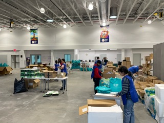 🎉 #CCBQ is excited to be celebrating our 125th year of service! We had an amazing group of @stjohnsu students join us in #Queens to pack 1k bags of toiletries & emergency food for migrants. Together, we're making a difference to help our community in need!❤️ #125YearsStrong