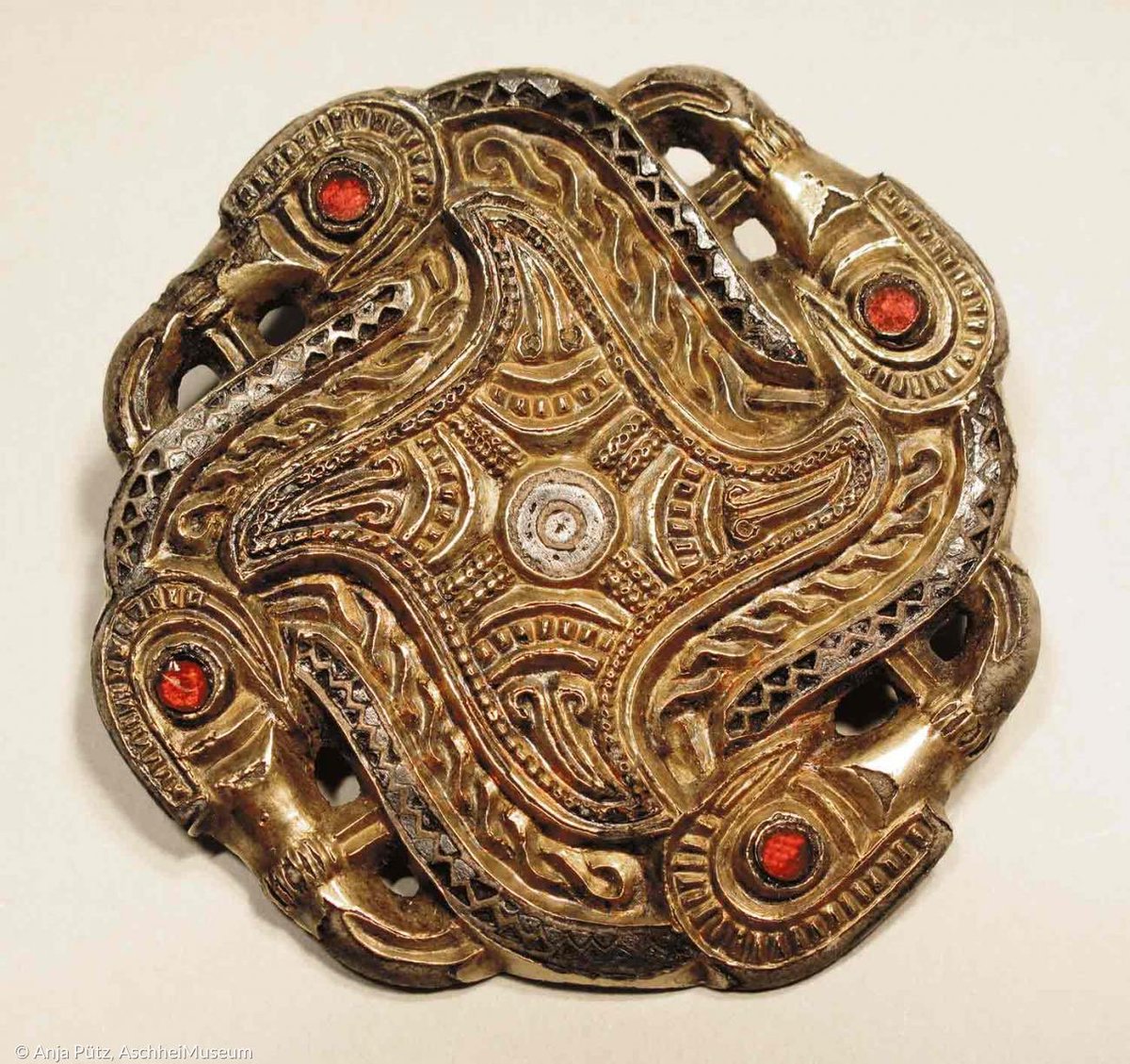 Stunning raven fylfot brooch from Aschheim, Bavaria, 6th Century.