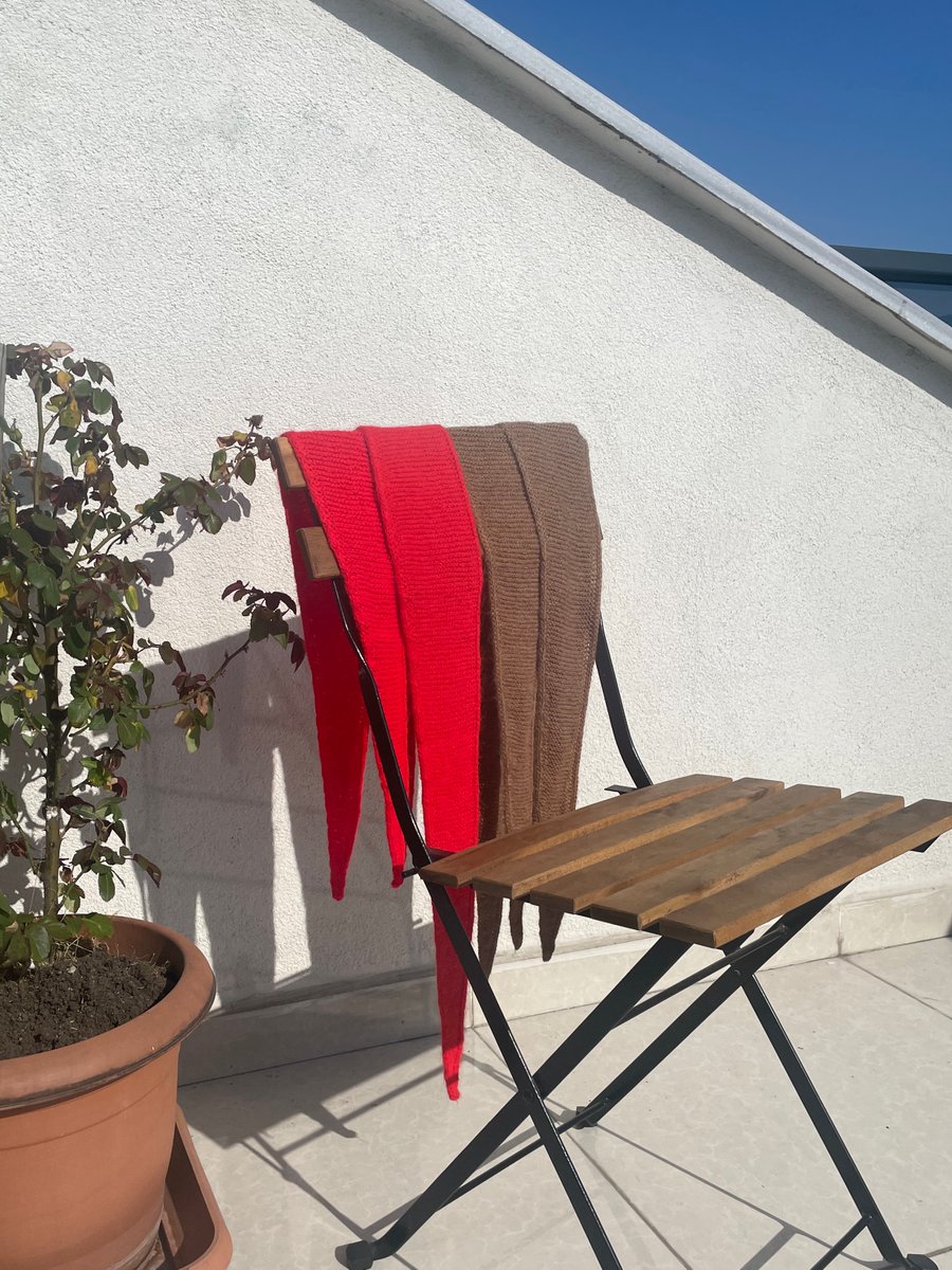 A highlight from last week: four pieces of scarves I handknit for various people in my life, drying in the sun