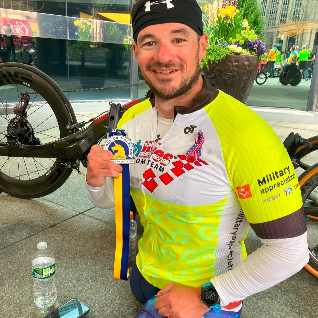 Congrats to Zach Stinson, #AchillesFreedomTeam veteran, on another first place handcycle finish at the @BostonMarathon! Thank you @MassGovernor for the finish line welcome! #GoAchilles #BostonMarathon #AbbottWMM