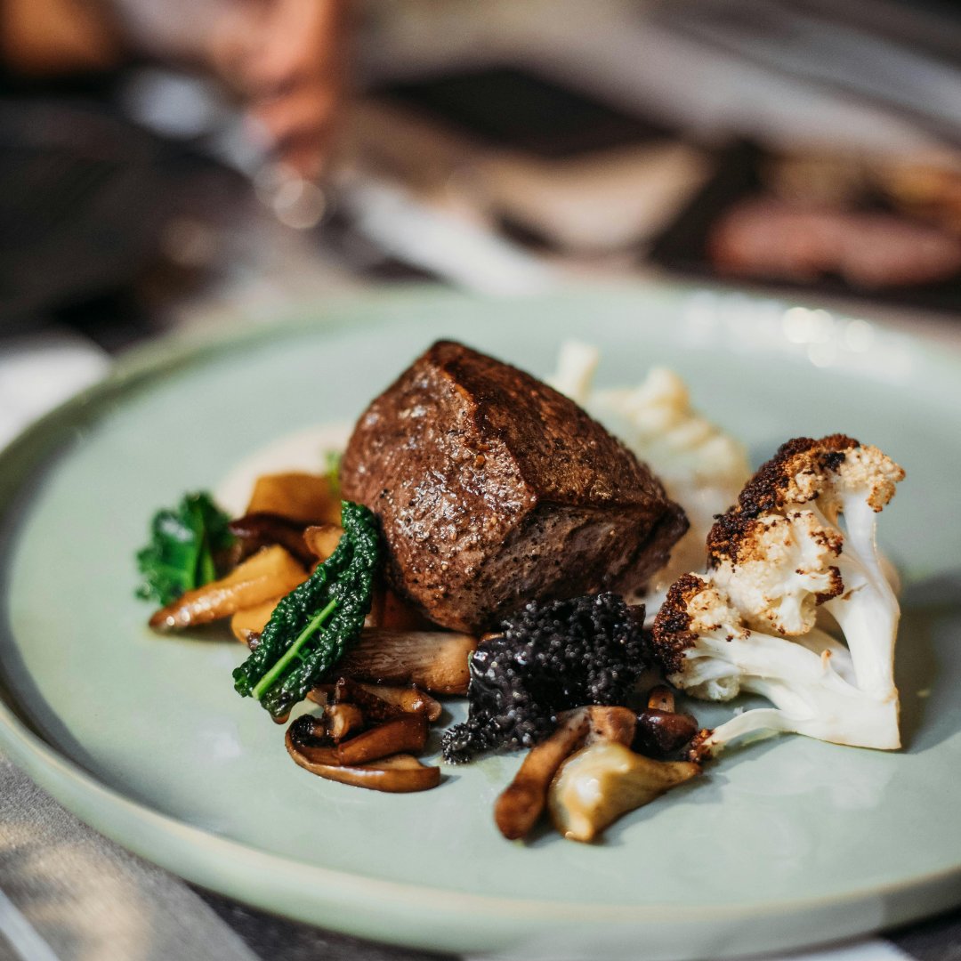 Enjoy this recipe for a seared Fillet Mignon with roasted vegetables:

2 Fillet Mignon steaks
2c Cauliflower &amp; Mushrooms
2 cloves garlic, minced
4 tbsp Olive Oil
4c kale leaves
S&amp;P

It is recommended to use the Platinum Grill Pan &amp; Medium Gourmet Skillet.