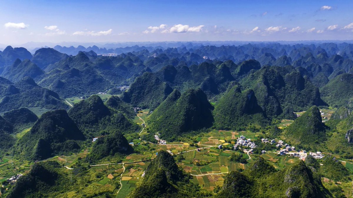 Aerial view of Qibainong national geopark in Dahua Yao Autonomous County, south China's Guangxi Zhuang Autonomous Region. 广西大化七百弄风光