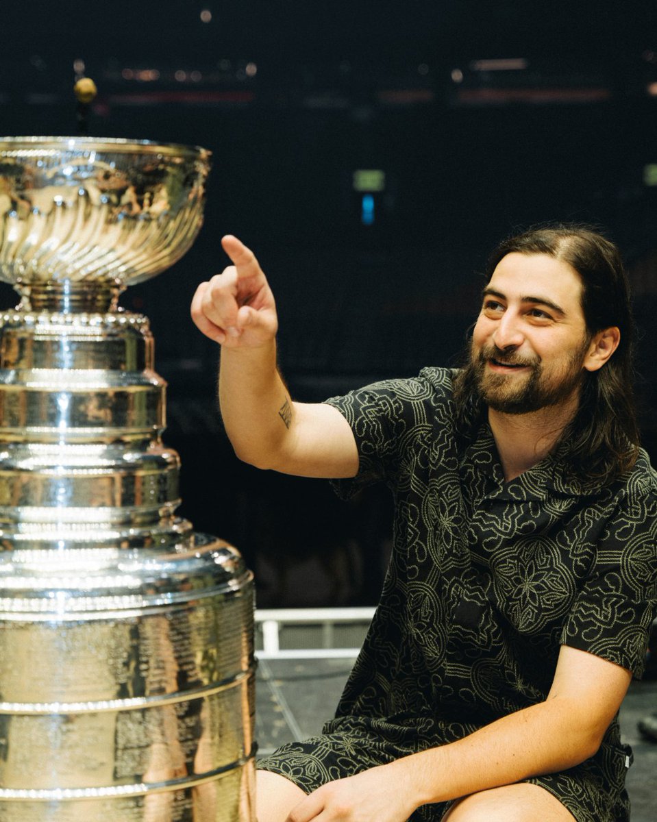 NHL's tweet photo. Season of the (hockey) sticks with @NoahKahan. 🎵 #StanleyCup https://t.co/W0jRLhF4BJ