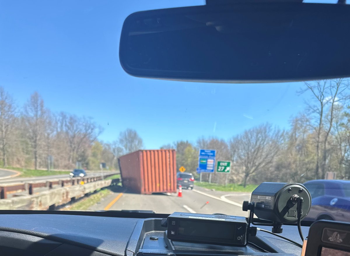 Dislodged container blocking the left lane of the northbound Hutchinson River Parkway at King Street. Right lane is open but expect delays for a while until it is removed. Your best bet: don't go this way for a few hours.