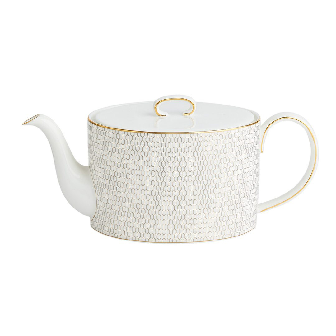 TEA TIME Wedgwood Gio Gold Teapot ($310) In 1995, Wedgwood was granted the Royal Warrant, a mark of recognition of those who have supplied goods or service to the Royal Household for at least five years, from her Majesty Queen Elizabeth II... simplybuckhead.com/tea-time-eleva…