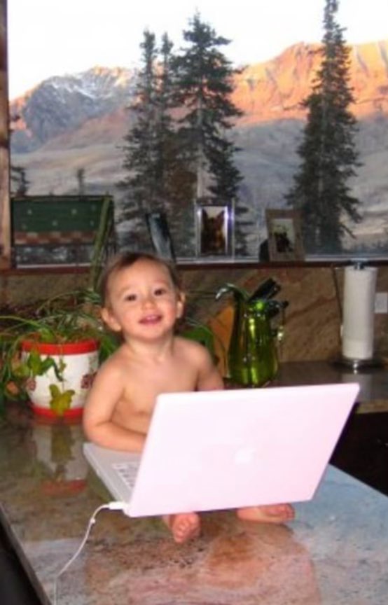 Telluride 2009 with junior checking his portfolio 🤗