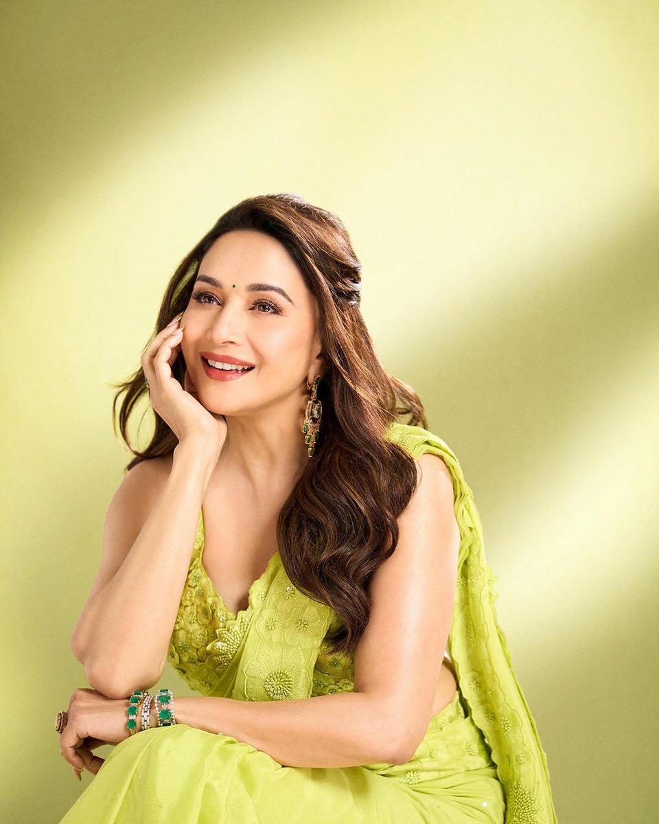 Radiating grace, #MadhuriDixit looks like a dream in this gorgeous neon green saree #saree #style #fashion #celeb #grace