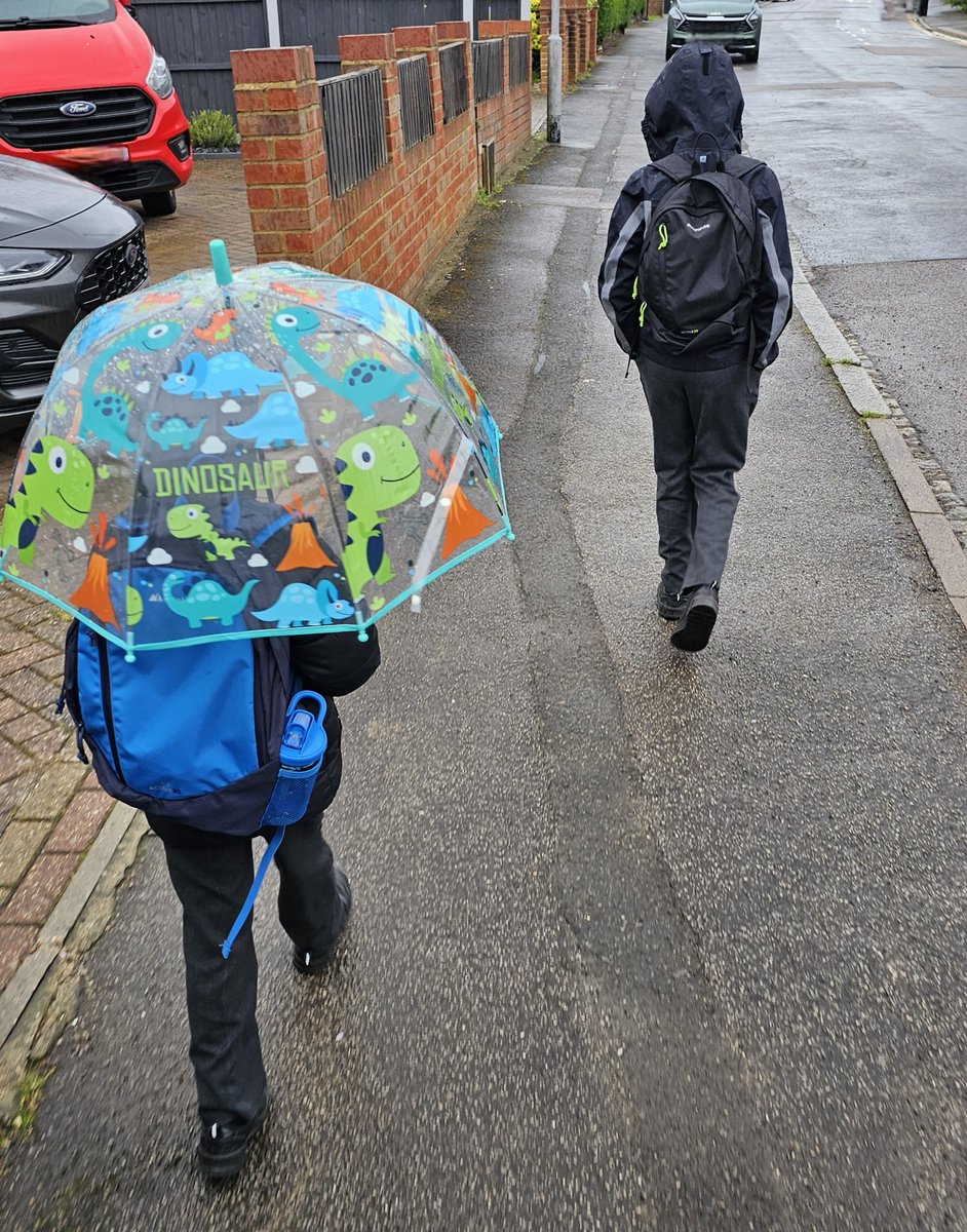 It's not a proper school run unless it's raining.