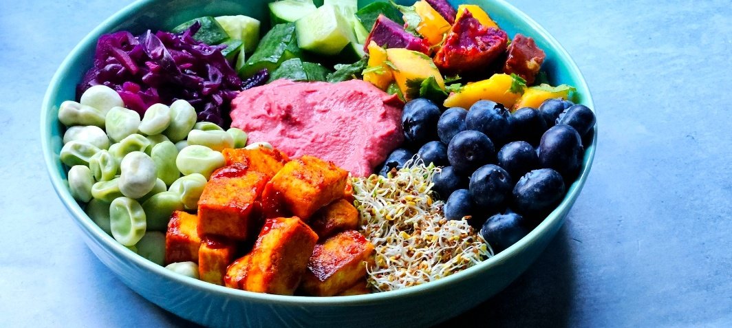 Day 23 of my 40-Day Daniel's Fast!

Today's super delicious salad bowl was a revisit of the gochujang tofu. I had some leftover beet hummus, fermented slaw, with fava beans, blueberries, red clover sprouts, cucumber, and a mango, purple sweet potato and coriander salad.
#vegan