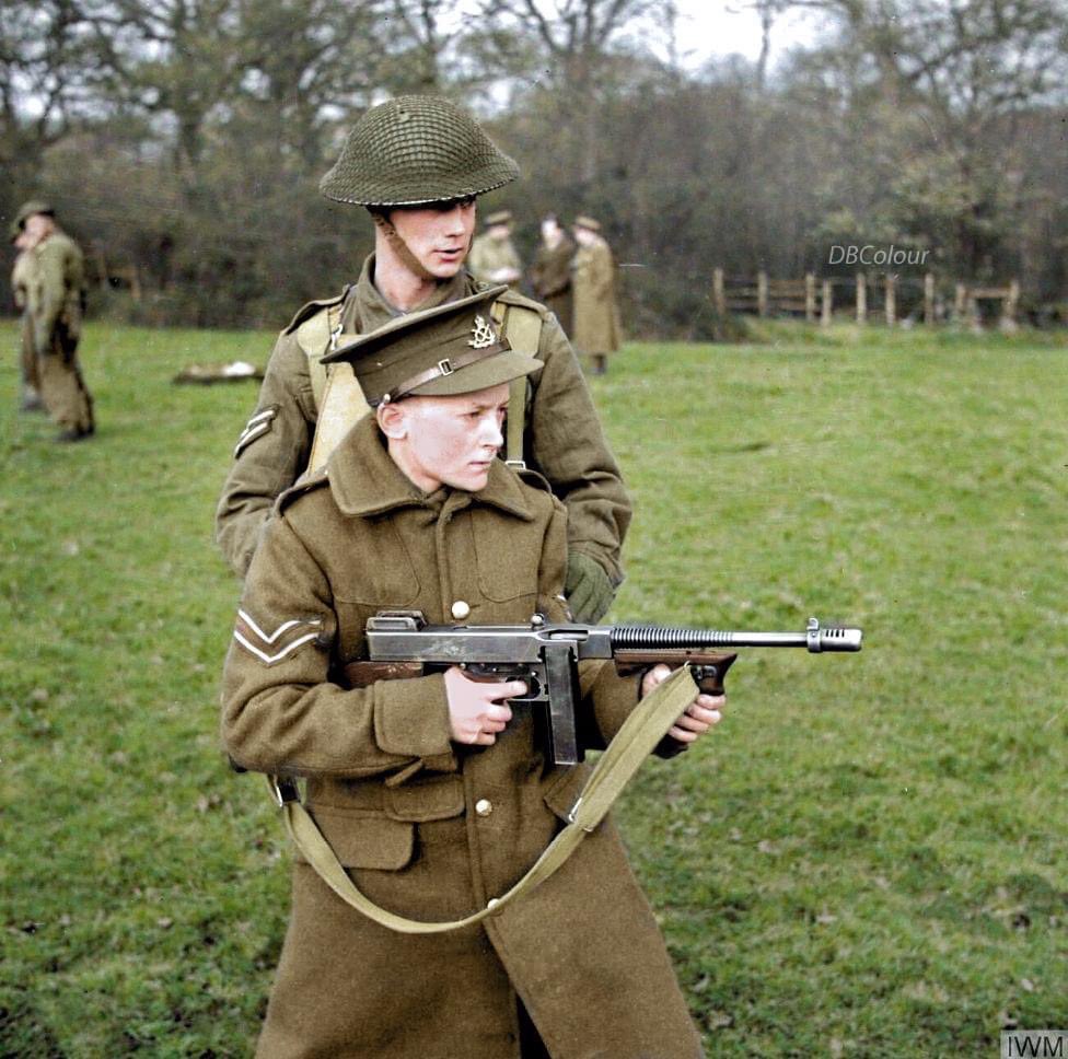8 January 1942
17 year-old Cecil Appleby from Queen Mary's School in Walsall learns to handle a 'Tommy gun' during a visit to a Junior Leaders school in the South Eastern Command.

(Photo source - © IWM H 16501)

#blitz #homefront #battleofbritain

Colourised by Doug