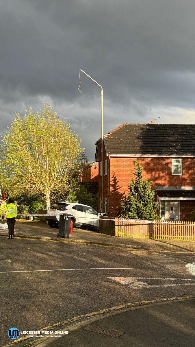 A car has crash into house on Glenfield Road this afternoon, the impact of the collision moved a streetlight which is now been pushed into the roofline of the house and is only being supported by the car. Damage to the house has been reported. The car remains and City