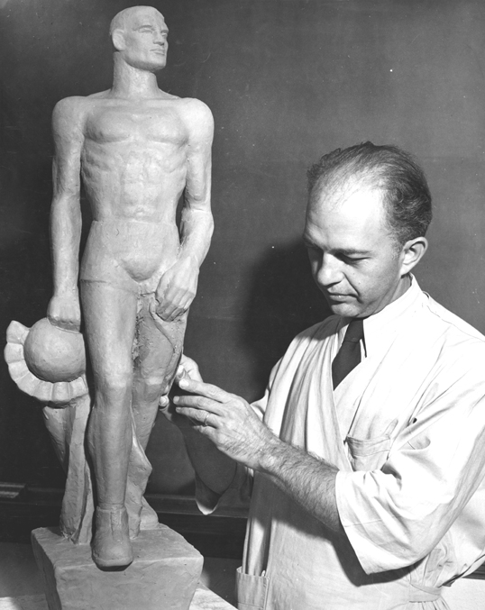 #DYK that sculptor Leonard Jungwirth designed the Sparty Statue on campus? This photograph from the 1940s shows Jungwirth sculpting a small model of Sparty. #MSUHistory