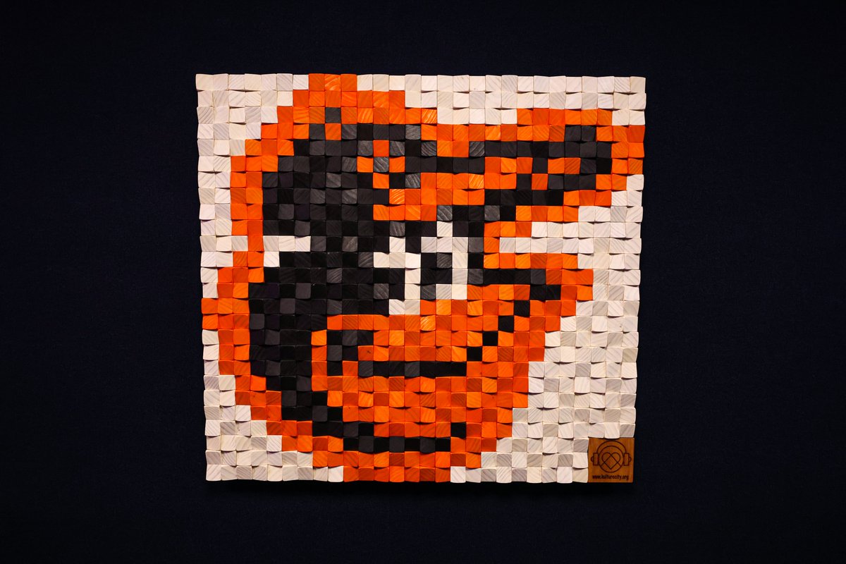 A photo of the inside of the sensory room, featuring a tactile wall with the image of The Oriole Bird.