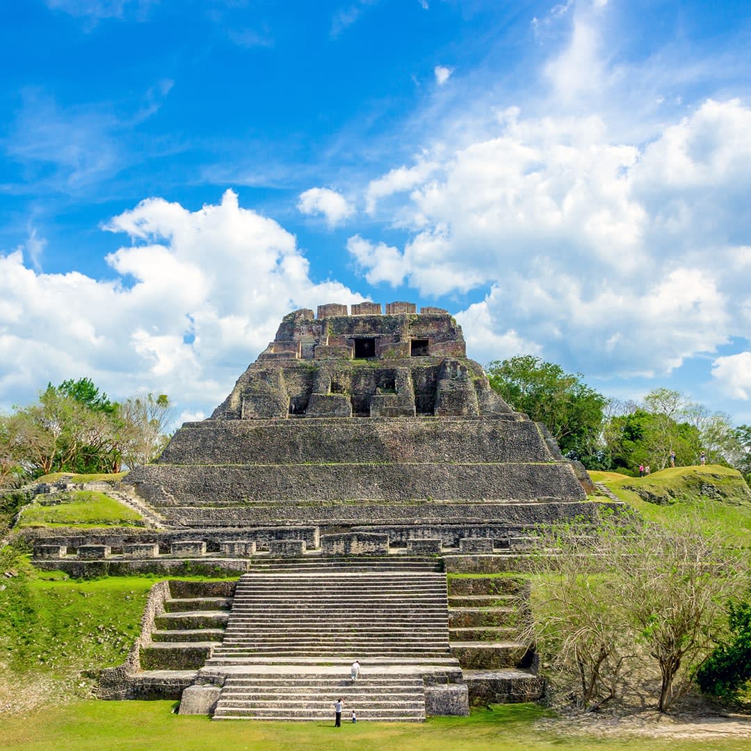 Book your journey to Belize's Xunantunich Mayan Ruins, where history unfolds in the jungle! Explore the rich tapestry of this ancient civilization amid lush foliage and archaeological wonders. There's adventure around every corner. Contact us! cpappin@dreamvacations.com