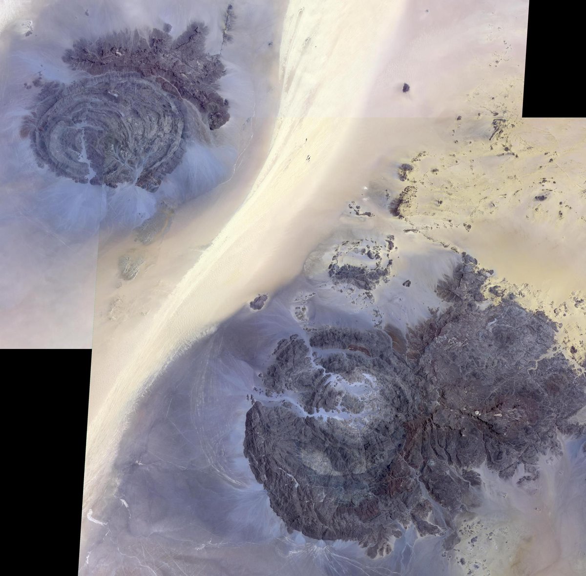 #PPOD: In the southeast corner of Libya, in the Libyan Desert, lie the uplifted massifs of Jebel Awenat and Jebel Arkenu. Both expose ancient Precambrian rocks, intruded by granites, and overlain with sandstones. Credit: @NASA METI/AIST/Japan Space Systems, and ASTER Science Team