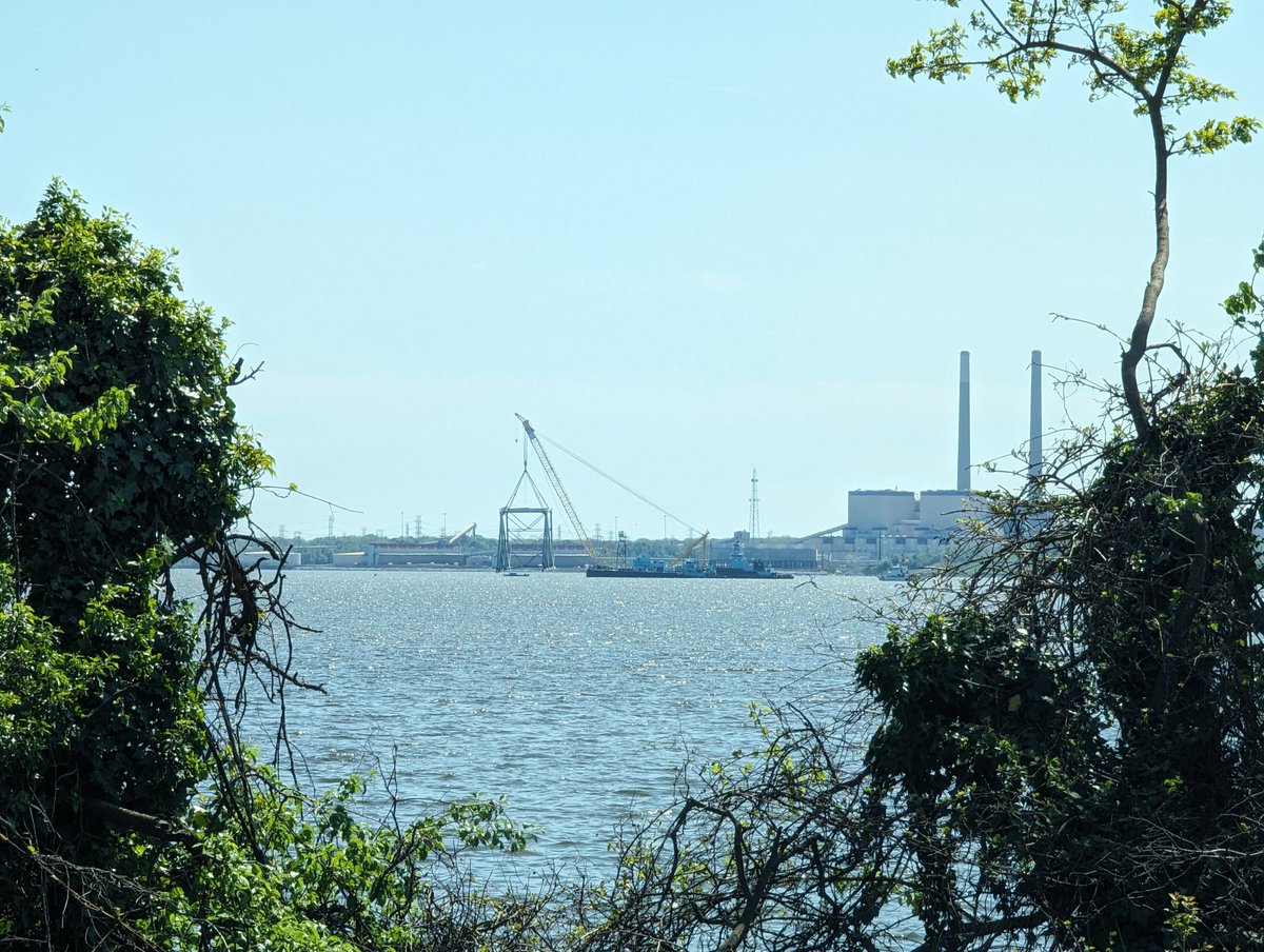 We're awaiting a media briefing from the governor, Coast Guard, and a bipartisan group of lawmakers. Cranes are moving a significant portion of steel from the water now.