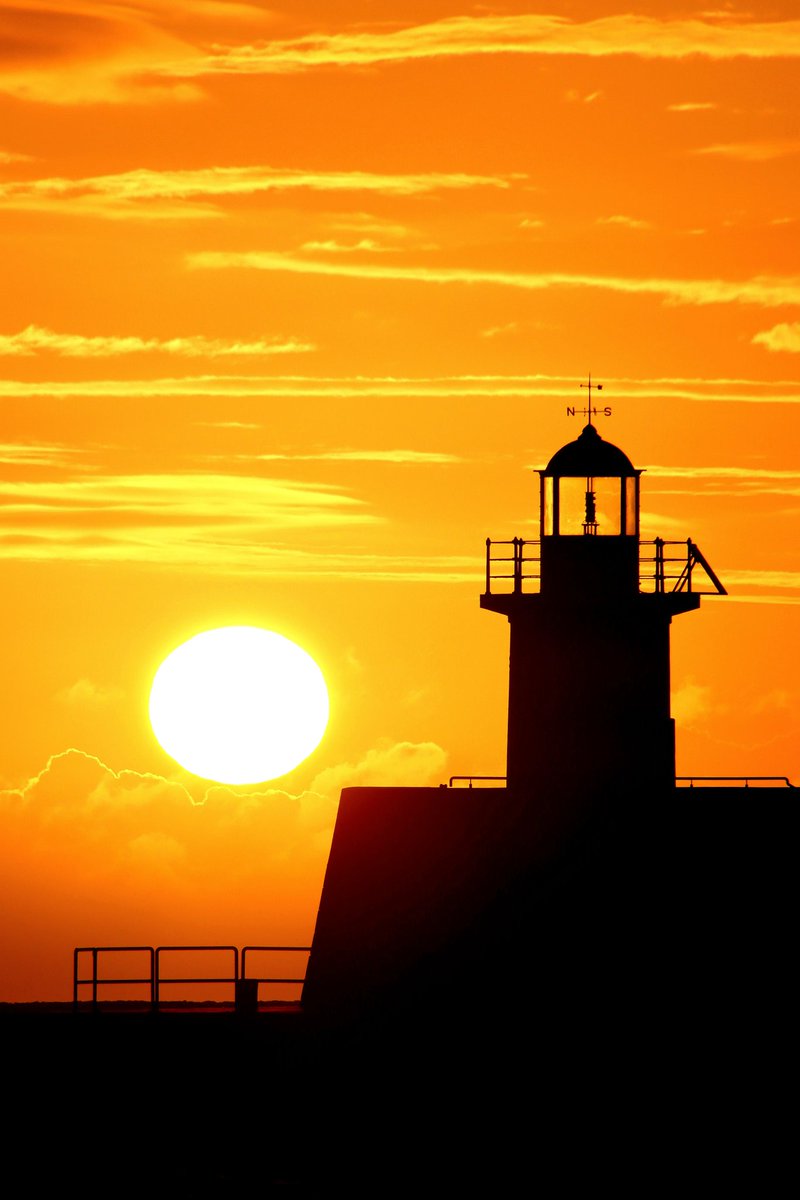 Sunrise in Wicklow this morning was so-so 🙂 #Sunrise #lighthouse #sea #Wicklow