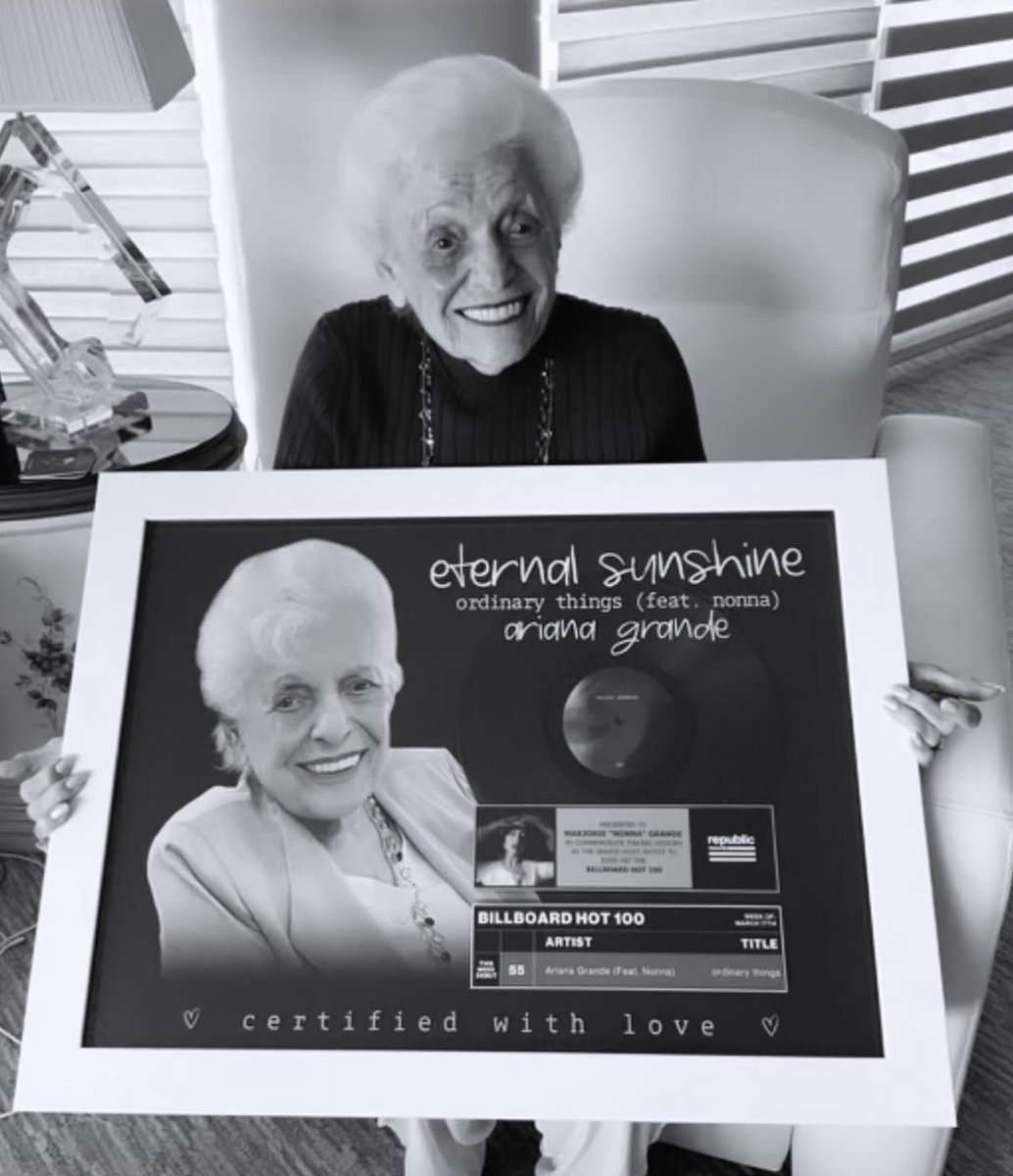 PopBase's tweet photo. Ariana Grande’s Nonna poses with her plaque for oldest person in history to chart on the Billboard Hot 100. https://t.co/kTeAKkalL0