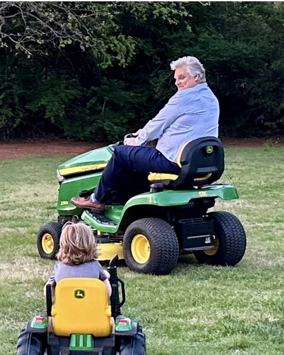 Dueling Deere’s. In the backyard with Jack during a dinner break between newscasts last Thursday evening.