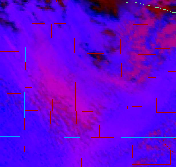Satellite imagery is showing a lot of blowing dust (areas in pink) across far southwest Kansas this afternoon and that can be seen with our Satanta mesonet camera. #kswx