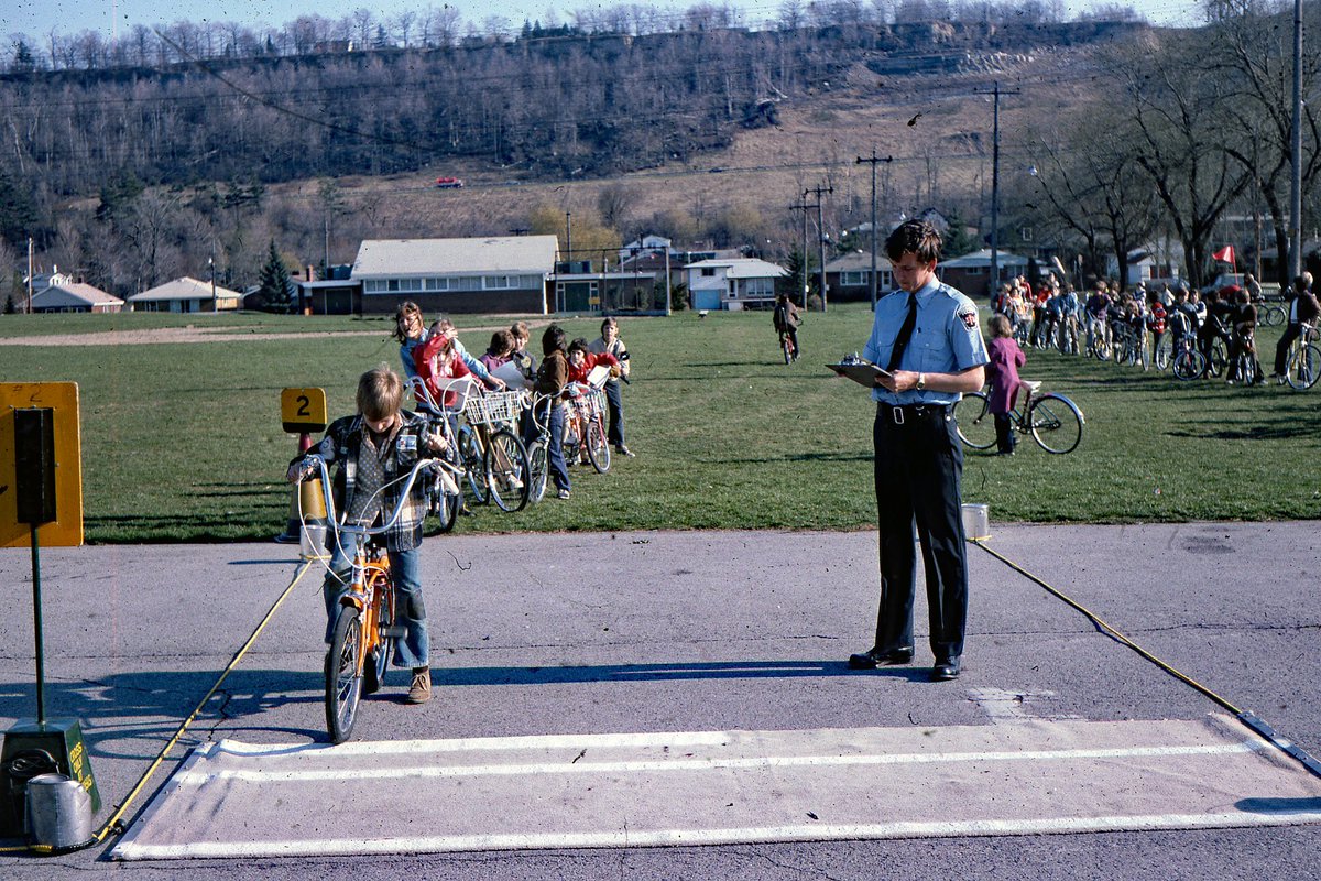 Cadet Morrison rates skills at a bike rodeo in west Hamilton. #HPSArchives #PoliceHistory #HamOnt #HamOntHistory #HPSHistory #HPSMuseum