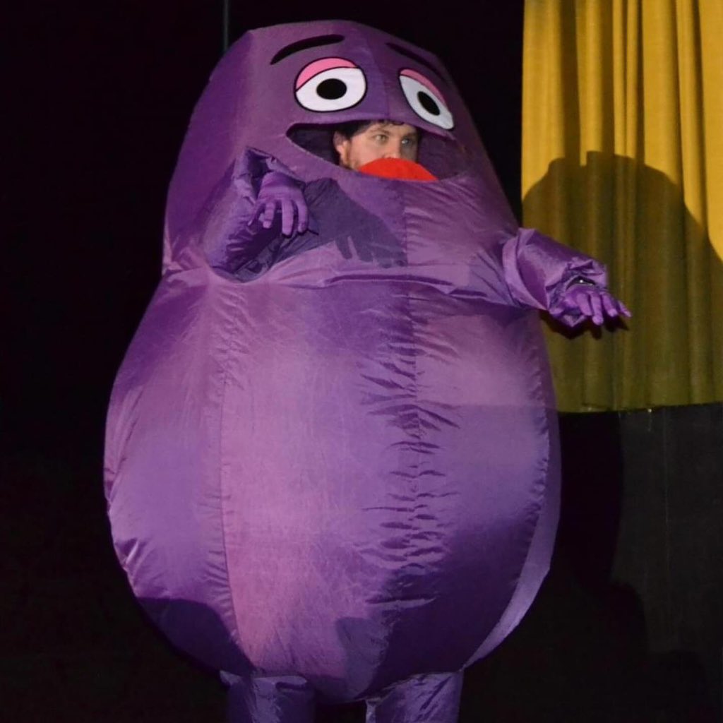 FNSRockyHorror's tweet photo. Idk.. I’m not saying Temu Grimace will become your sleep paralysis demon if you don’t come to our show on Friday… but maybe grab your 🎟️ just in case… 👀 

Join us then for some goooood ol’ Rocky Horror 👄 https://t.co/U1W3fcQuIc